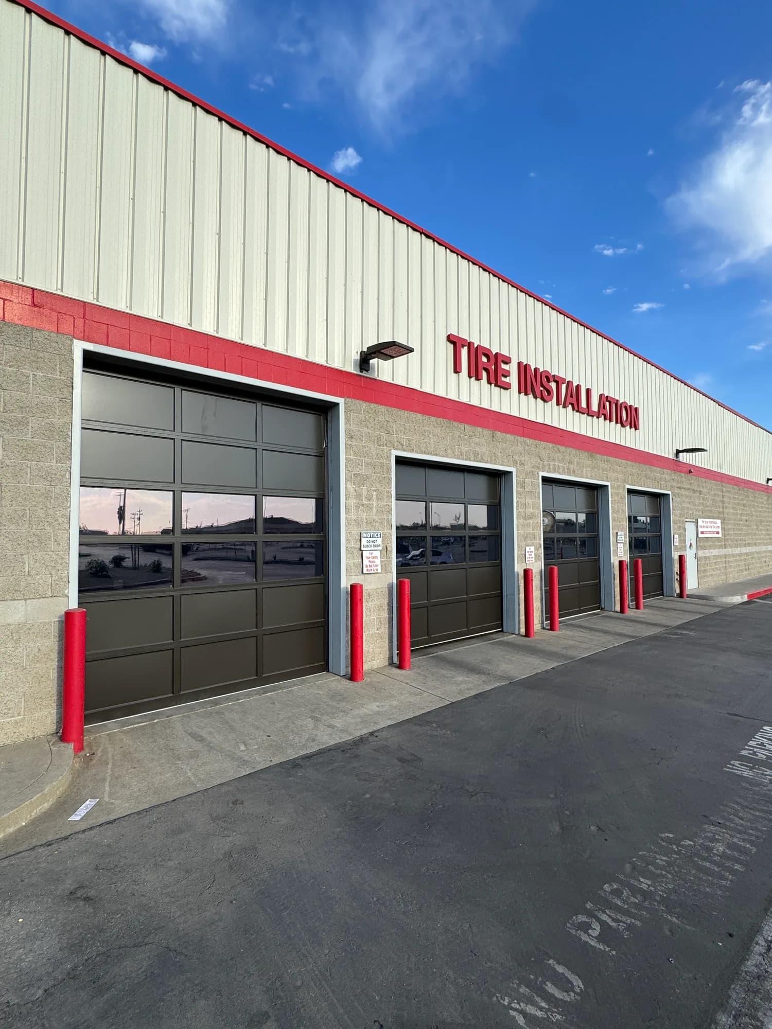 Tinted glass panels in the service bay doors at the Costco Tire Center in Merced CA