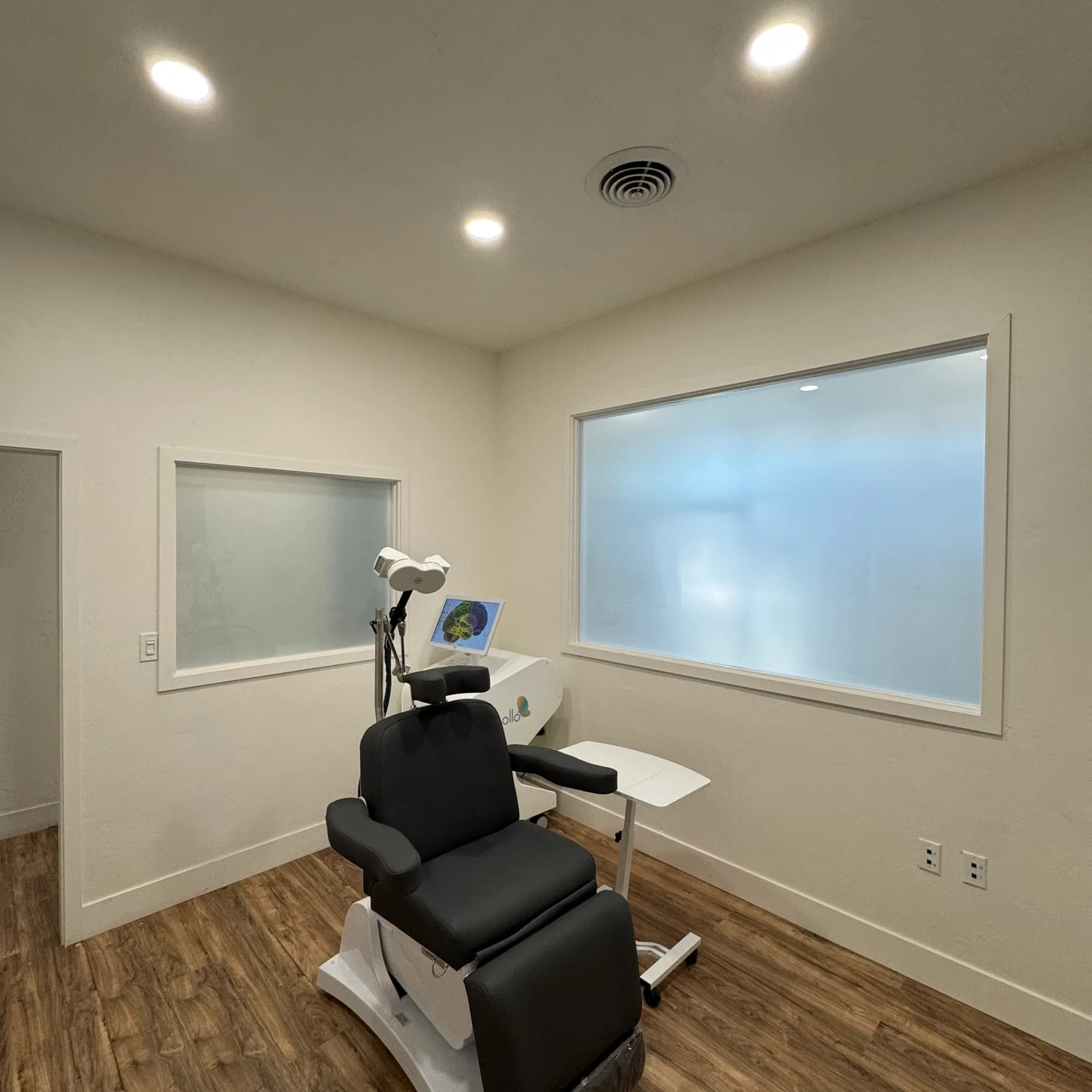 Frosted privacy window film on the interior windows of a behavioral health treatment room in Atwater CA