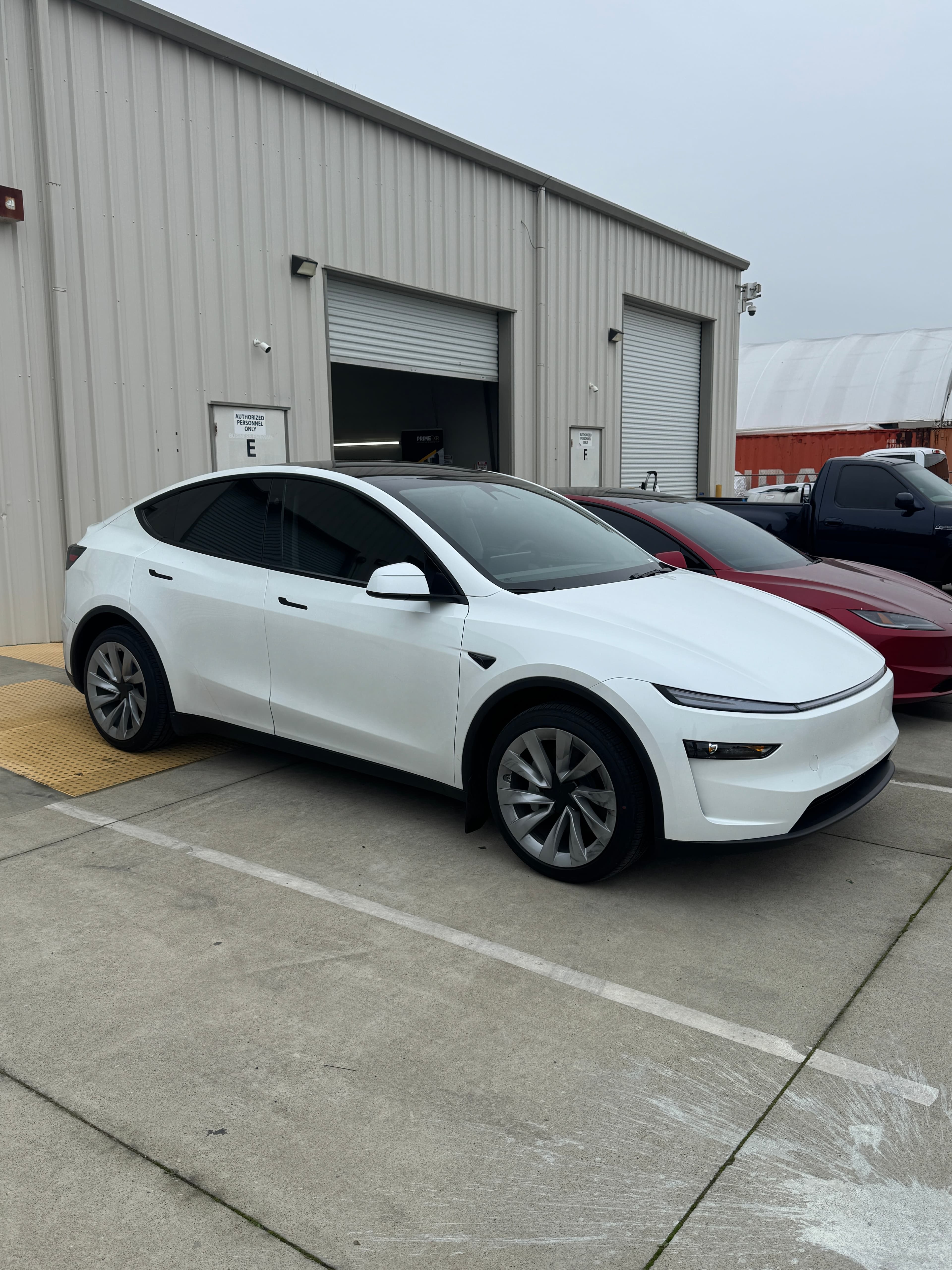 White Tesla Model 3 at Top Tier Tinting shop Atwater CA