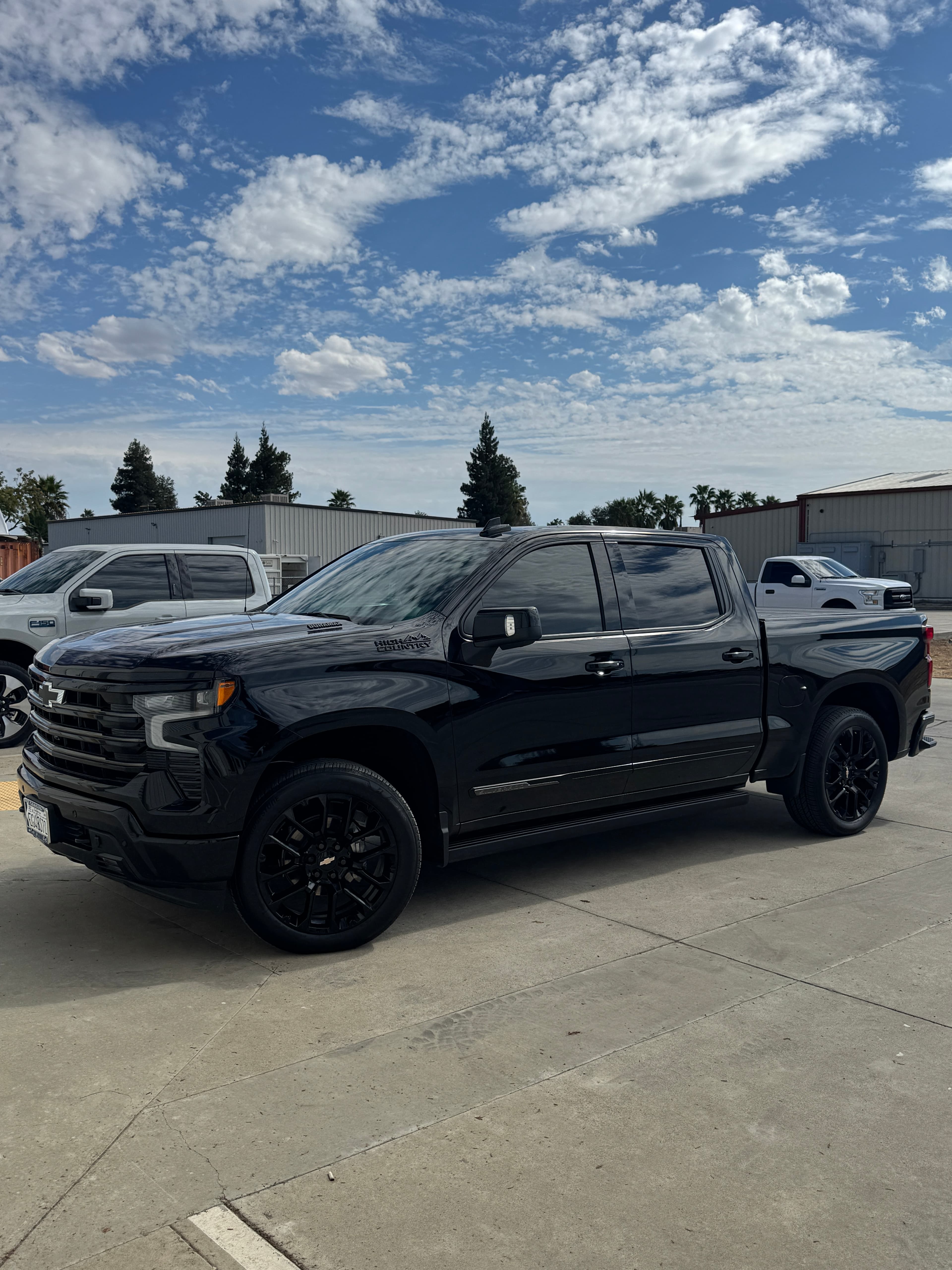 Dark sedan with ceramic window tint at Top Tier Tinting Atwater CA