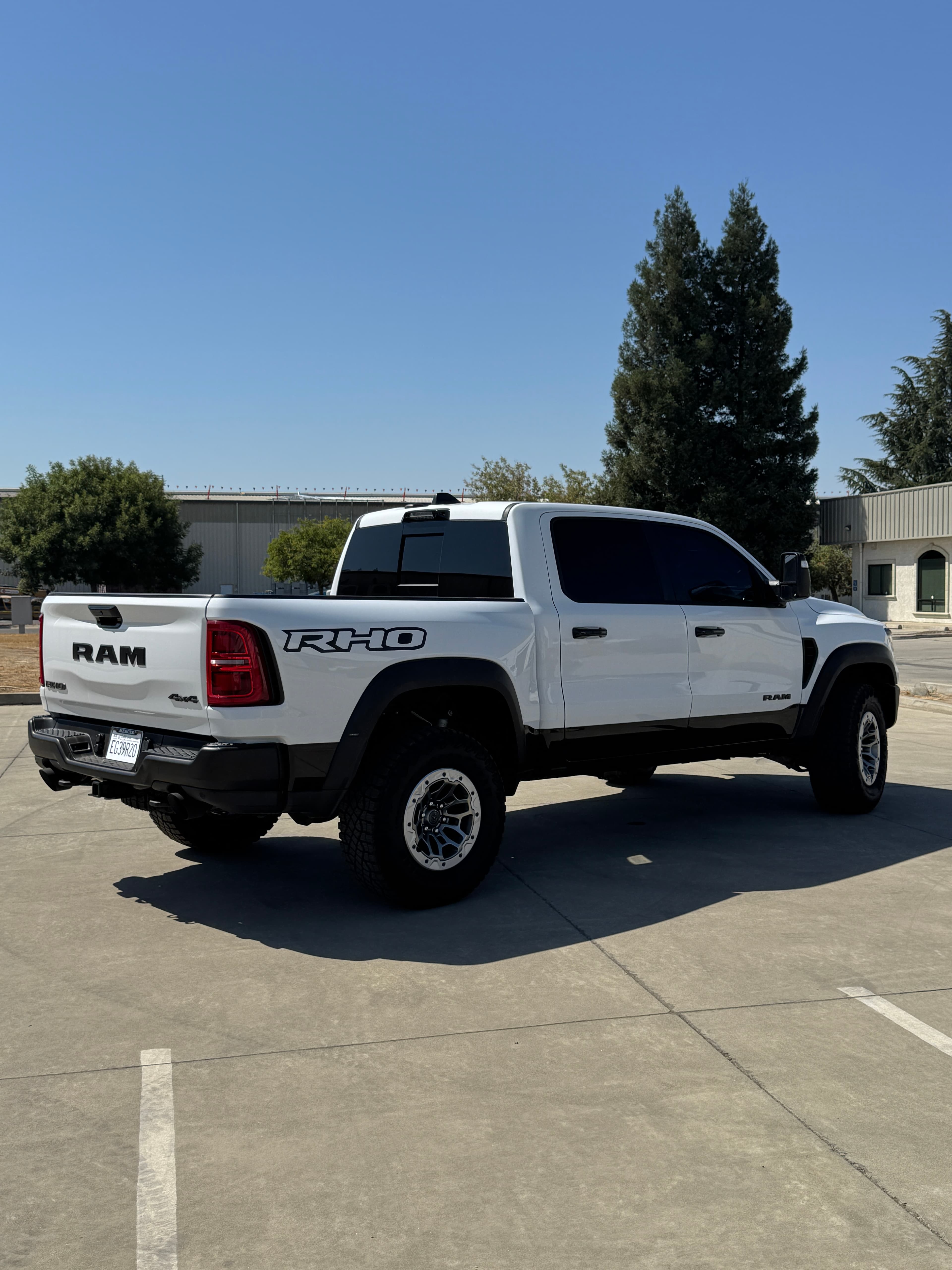 Paint protection film on white Ram rear at Top Tier Tinting Atwater