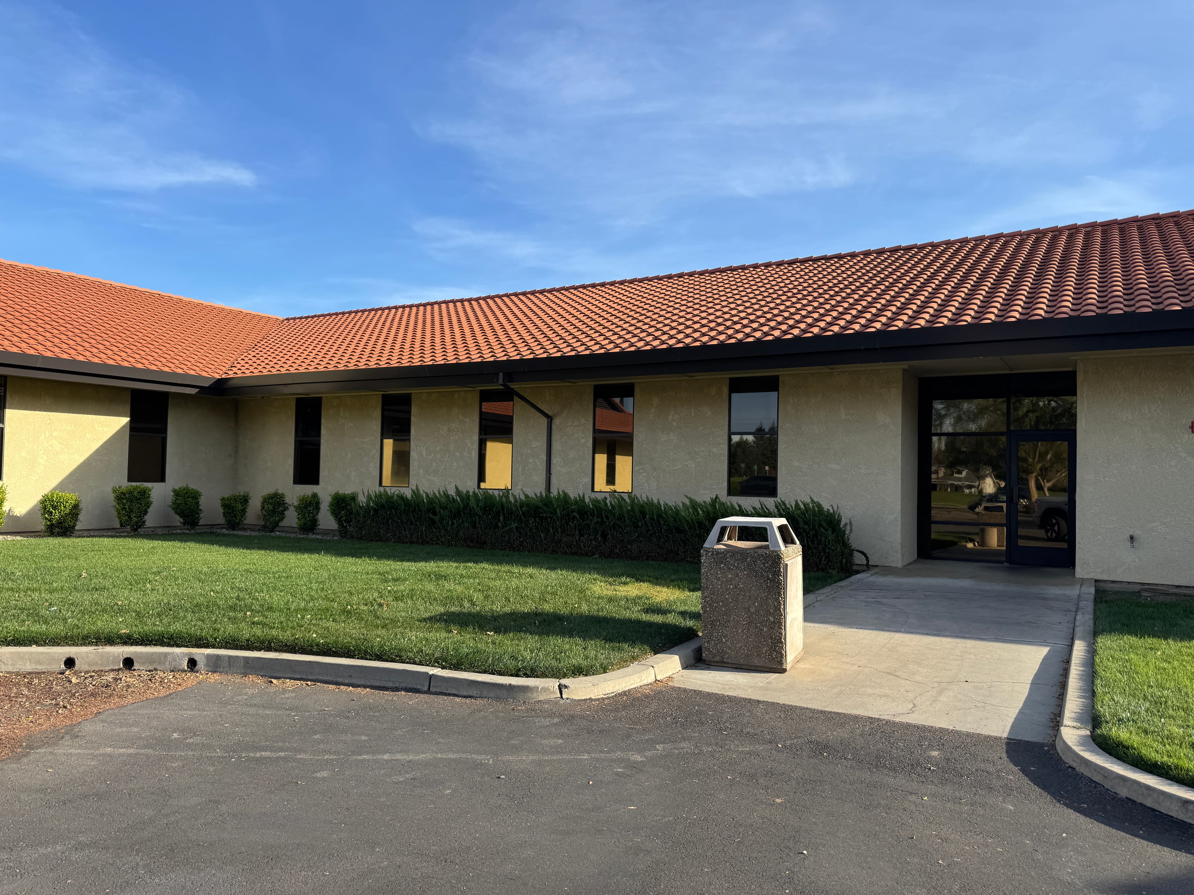 Commercial window tint reducing glare in Merced County office